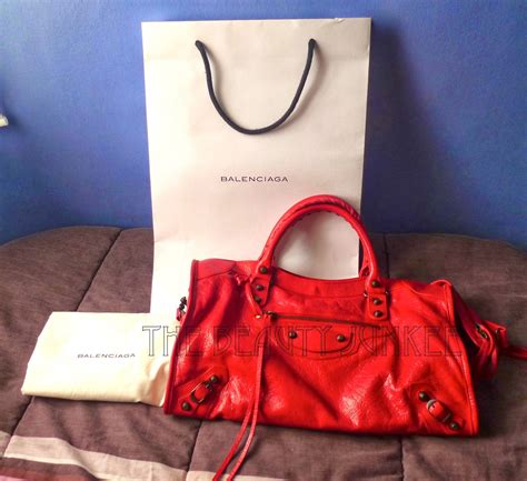 how to spot a fake balenciaga part time bag|balenciaga bag lookup.